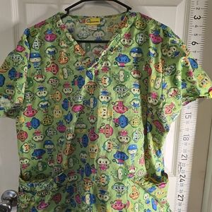 WonderWink Lime Green Kids V-Neck Scrub Top with Multicolor Cartoon Faces